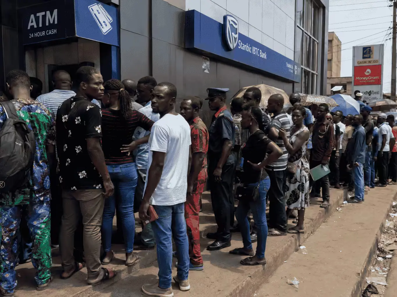 A long queue outside a Stanbic IBTC Bank branch during the 2023 naira cash shortage